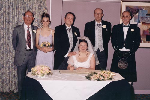 [Signing the register]